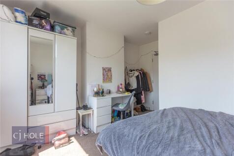 Bright and inviting double bedroom featuring am...