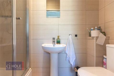A modern and well-maintained bathroom featuring...