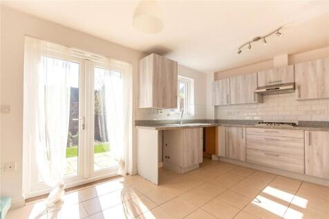 Bright and spacious kitchen with modern cabinet...