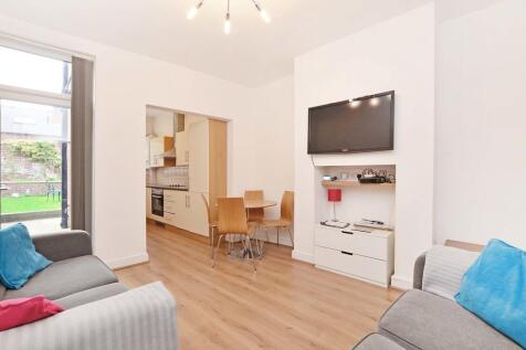 Bright and welcoming living room featuring mode...