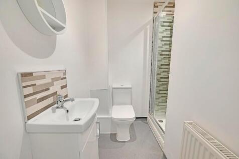 A modern and well-maintained bathroom featuring...