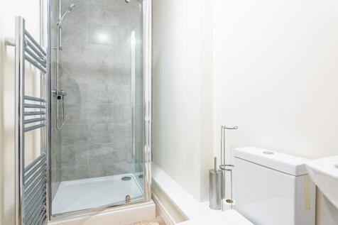 A modern and well-maintained bathroom featuring...