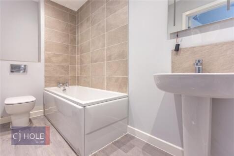 A modern, well-maintained bathroom featuring a ...