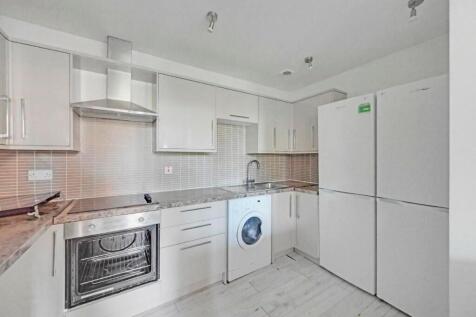 Modern kitchen featuring ample countertop space...