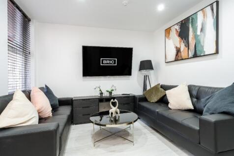 This contemporary living room features stylish ...