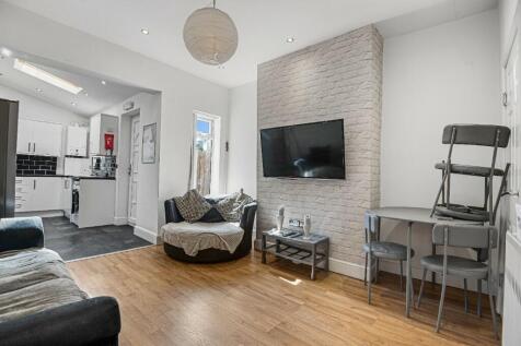 Contemporary living room with a modern open-pla...