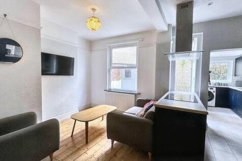 A modern living room featuring comfortable seat...