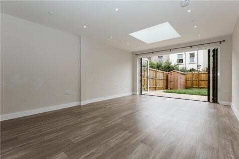 Bright and spacious modern living room with lar...