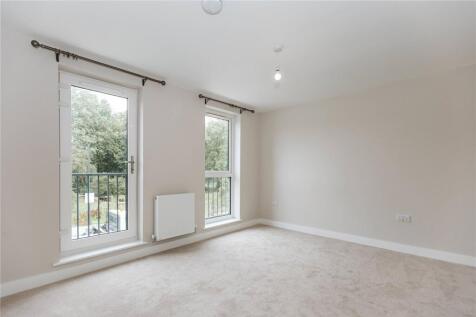 Bright and airy double bedroom featuring large ...