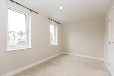 Bright and clean double bedroom featuring two l...