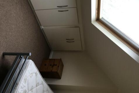 Bright and clean single toilet room with natura...