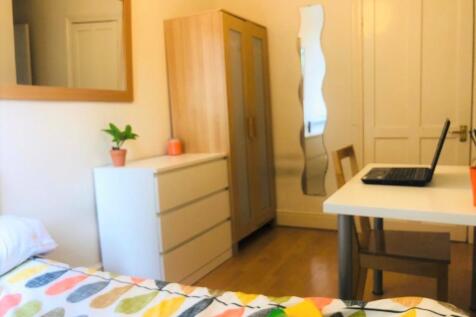 Bright and inviting double bedroom featuring wa...