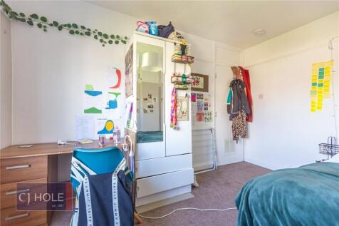 Bright and inviting double bedroom featuring a ...