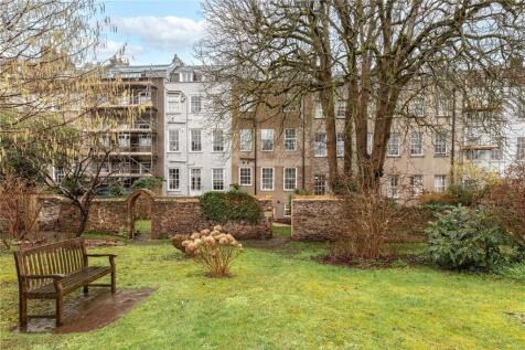 A peaceful, well-maintained garden area featuri...