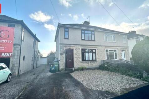 A neat semi-detached house with a clean drivewa...