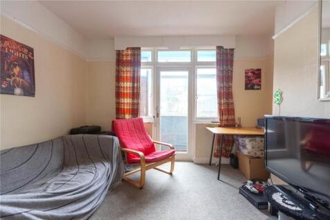 Bright and welcoming living room featuring a co...