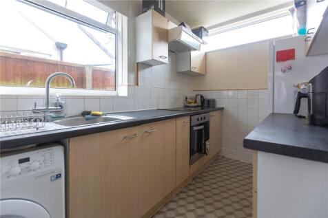 Bright and functional kitchen featuring ample c...