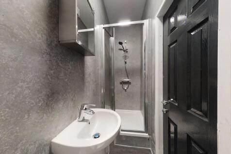 A modern and well-maintained bathroom featuring...