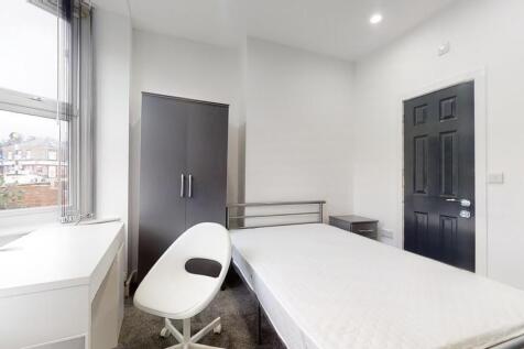 Bright and minimalistic single bedroom featurin...
