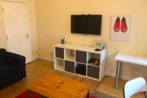 Bright and welcoming living room featuring a mo...