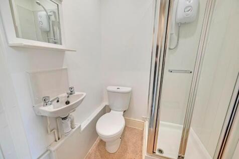 A bright and clean bathroom featuring a modern ...
