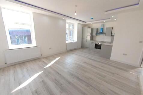 Bright and spacious contemporary living room fe...