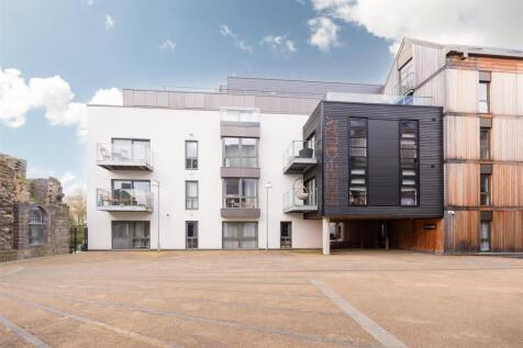 Modern terraced property with clean, open court...