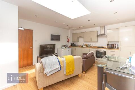 A modern and inviting living room with a comfor...