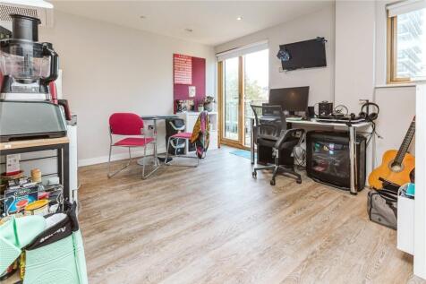 Bright and well-organized living space featurin...