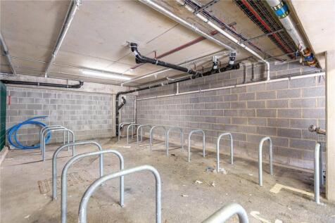 A secure indoor bike storage area with multiple...