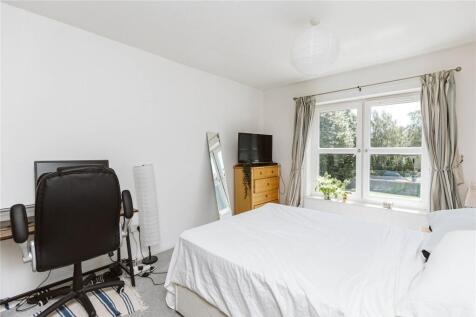 Bright and cozy double bedroom featuring a comf...