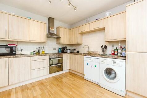 Bright and spacious kitchen featuring modern wo...