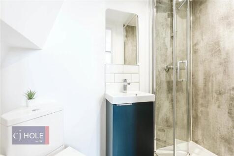 A modern, well-maintained bathroom featuring a ...