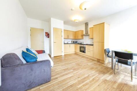 Bright and modern open-plan living space with a...