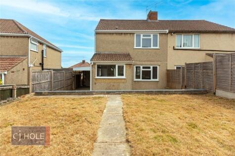 A well-maintained rear view of a semi-detached ...