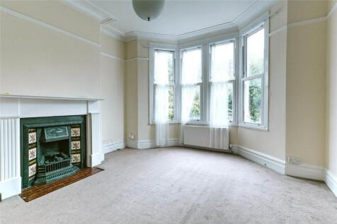 Spacious and bright master bedroom featuring a ...
