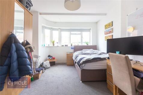 Bright and inviting double bedroom featuring a ...