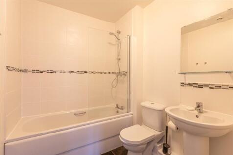 Bright and clean bathroom featuring a full bath...