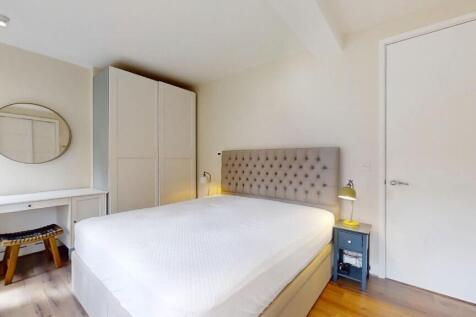 Bright and inviting double bedroom featuring a ...