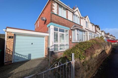 A charming exterior view of the property showca...