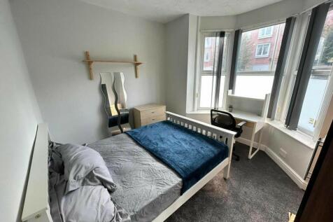 Bright and inviting double bedroom featuring a ...