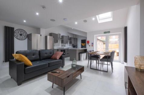 A spacious and modern living room, perfect for ...