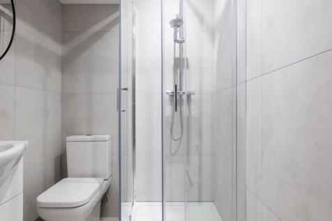 A modern and clean bathroom featuring a sleek s...
