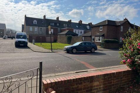 Bright and well-maintained front view of a semi...