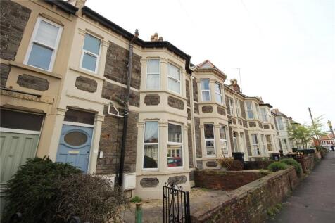 A charming row of traditional terraced houses w...