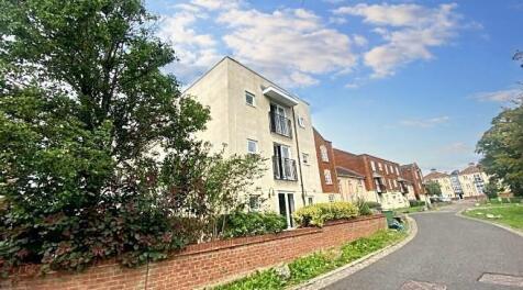 Wide view of a modern residential street featur...