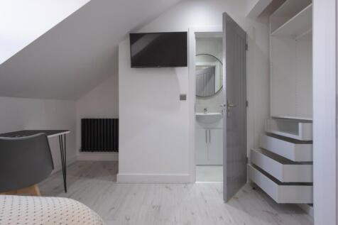 A stylish and well-maintained room featuring a ...