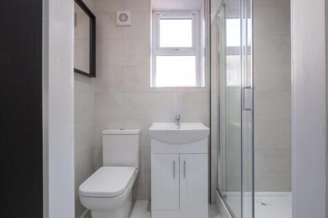 Modern bathroom featuring a sleek shower, styli...