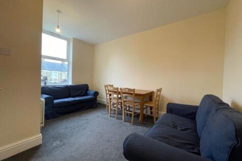 A cozy living room featuring two comfortable so...