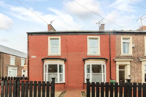 Charming traditional terraced house with a neat...